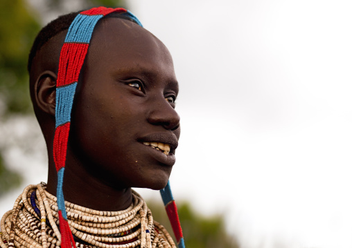 Portrait Of A Karo Tribe Woman With Traditional Necklaces And Headband, Korcho Village, Omo Valley, Ethiopia