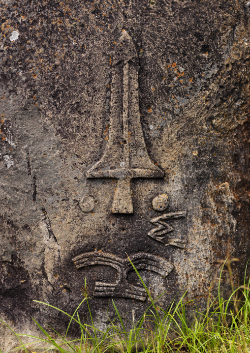 Carved headrest and dagger in the site of tiya, Unesco world heritage site, Tiya, Ethiopia