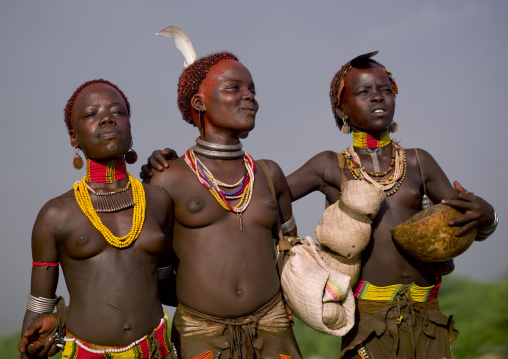Three Awesome Young Hamer Tribe Teenagers Looking Away, Omo Valley, Ethiopia