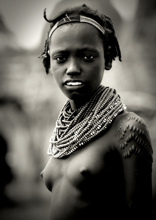 Black And White Portrait Of A Dassanech Tribe Woman With Necklaces, Omo Valley, Omorate, Omo Valley, Ethiopia
