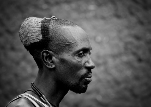 Black And White Profile Portrait Of Hamar Tribe Man With Mud Bun In Turmi, Omo Valley, Ethiopia
