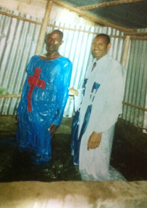 Old picture of mister Zaid having baptism when he converted from islam to christianity, Addis Ababa region, Addis Ababa, Ethiopia