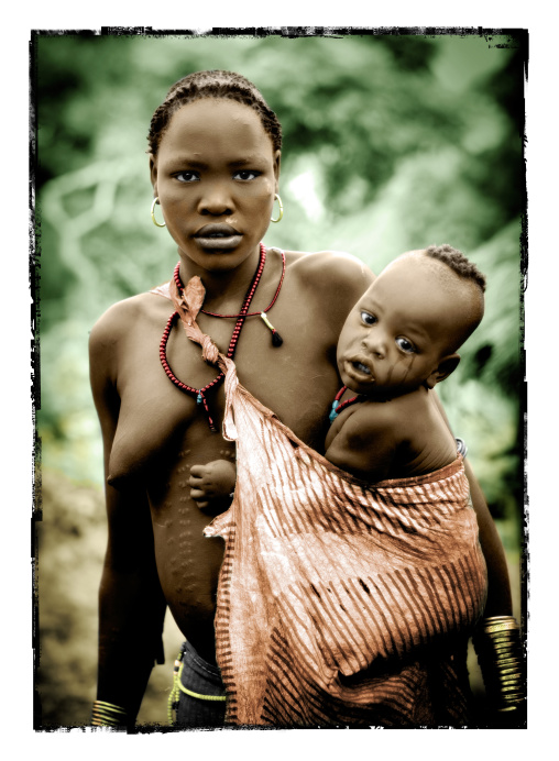 Portrait Of A Bodi Tribe Mother And Baby, Omo Valley, Ethiopia