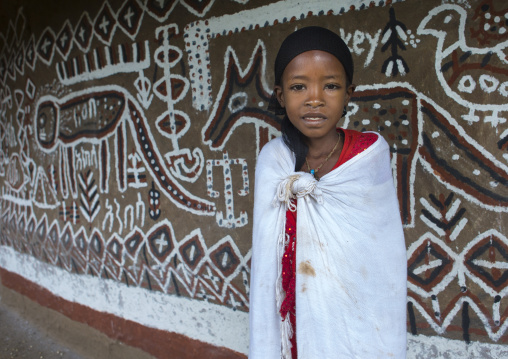 Girl Posing In Front Of A Decorated House, Adama, Omo Valley, Ethiopia