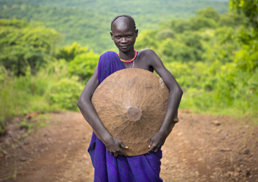 Gold searcher from Suri tribe, Tulgit, Omo valley, Ethiopia