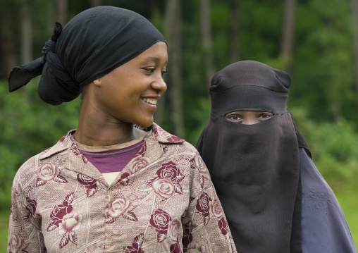 Two women smiling, Adama, Omo valley, Ethiopia