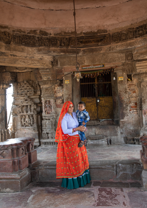 Indian mother with her son in Harshat Mata temple, Rajasthan, Abhaneri, India