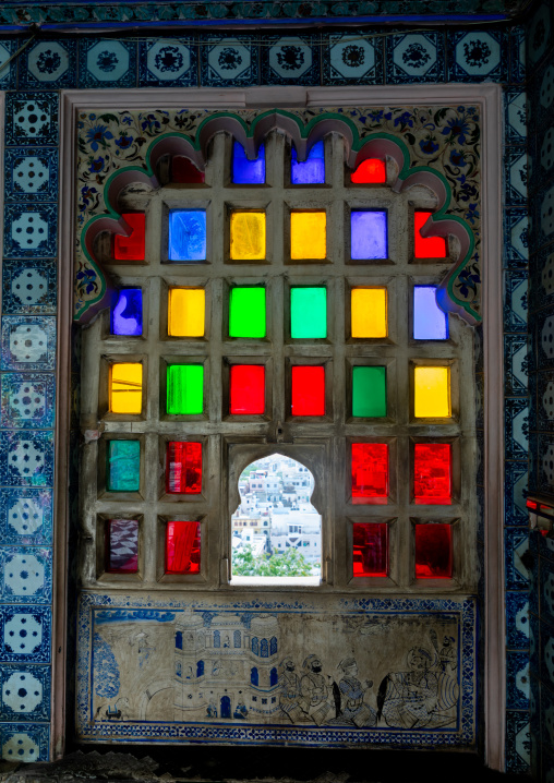 Multi coloured stained glass windows in the city palace, Rajasthan, Udaipur, India