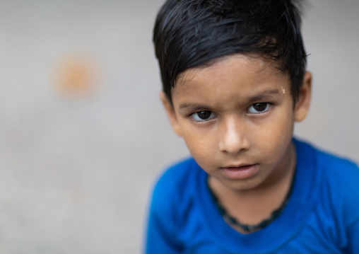 Portrait of a rajasthani boy in blue clothes, Rajasthan, Bundi, India