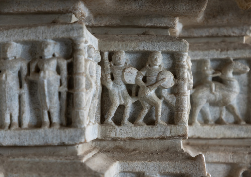 Carved bas relief made of white marble on the wall of Tirthankar jain temple, Rajasthan, Ranakpur, India