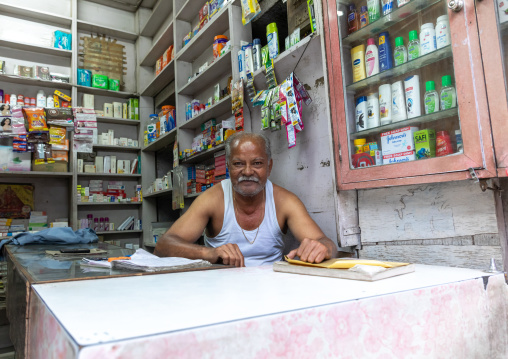 Indian man in his beauty shop, Rajasthan, Jodhpur, India