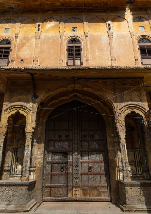 Wooden door of an old haveli, Rajasthan, Jaipur, India