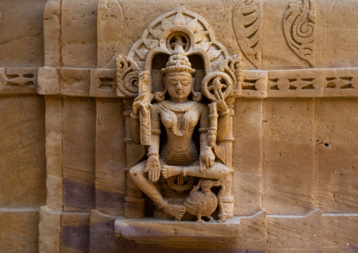 Carved idol on the wall of a jain temple, Rajasthan, Jaisalmer, India