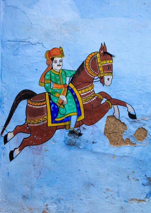 Murals depicting a horseman on an old blue house of a brahmin, Rajasthan, Bundi, India