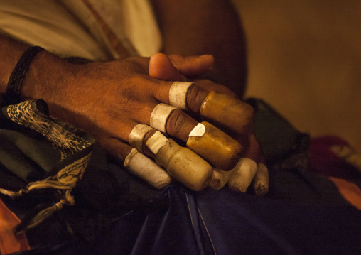 Hands Of A Maddalam Player Covered By Rice-clay Finger Rings During A Kathakali Performance, Kochi, India