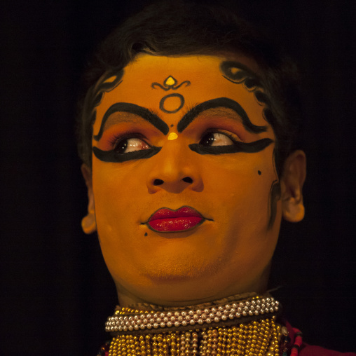Portait Of A Kathakali Dancer  Performing A Woman Role With Traditional Face Make Up, Kochi, India