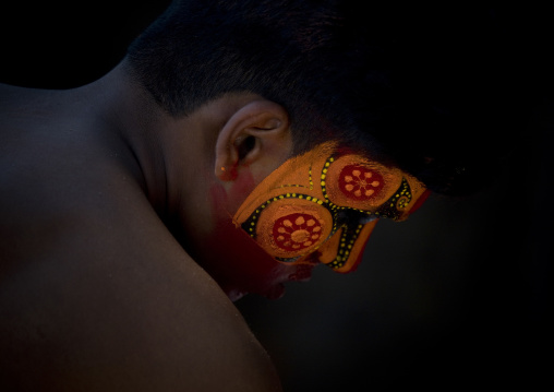 Theyyam Artist With Traditional Painting On His Face Side View, Thalassery, India