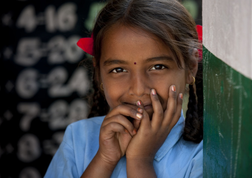 Schoolgirl With Bunches Leaning Against A Wall, Mysore, India