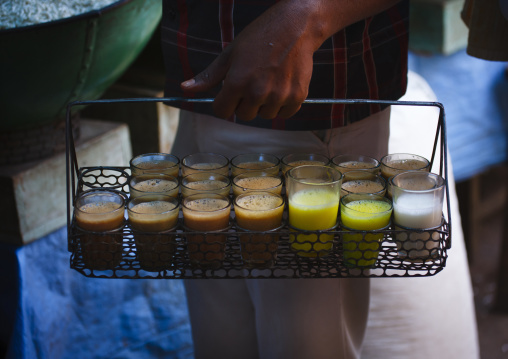 Man Holding A Basket Full Of Milk Tea Drinks, Mysore, India