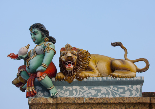 Colorful Statues Of A Hindu Goddess And A Roaring Lion At Kapaleeswarar Temple, Mylapore, Chennai, India