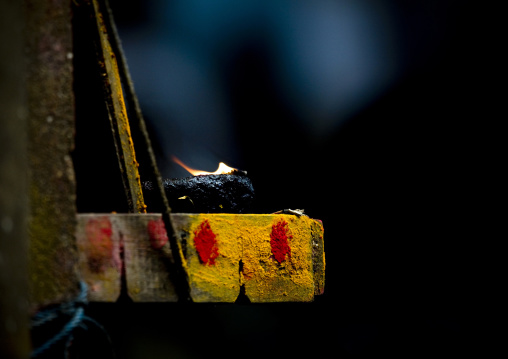 Candle Burning In A Temple, Pondicherry, India