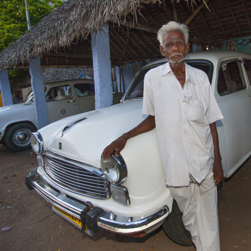 Old Man With Gray Hair Posing Proudly In Front Of A Famous Indian Car Called The Ambassador, Trichy, India