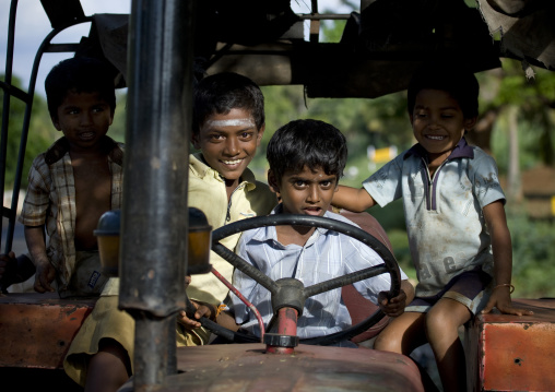 Young Group Of Friends Driving A Tractor And Having Fun, Madurai, India