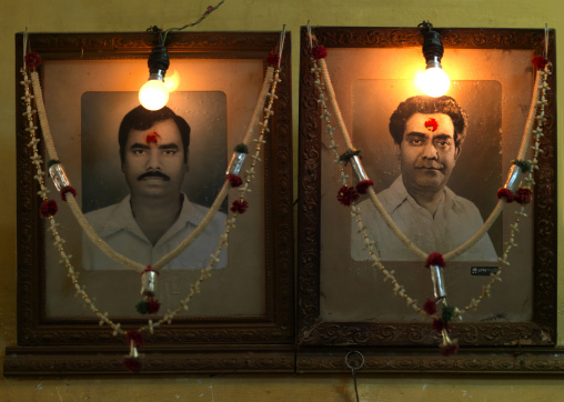 Black And White Framed Photos Of Two Men Hung On A Wall, Pondicherry, India