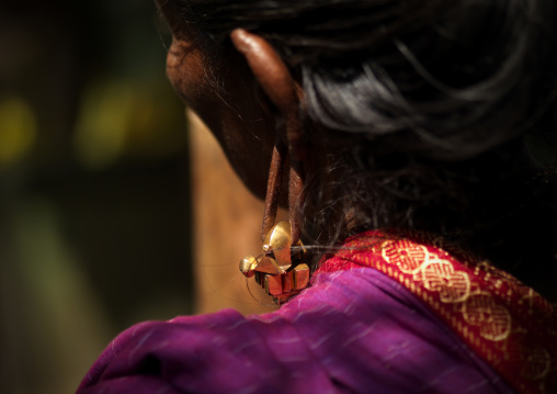 Traditional Golden Earrings Stretching A Woman's Earlobe, Madurai, India