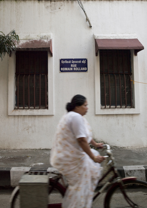 Passer-by Woman Riding A Bicycle In Romain Rolland Street, Pondicherry, India