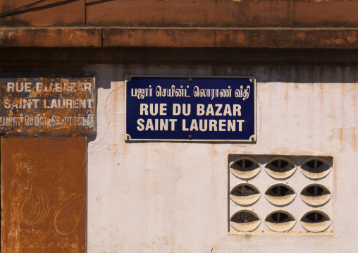 Street Sign On A Wall In Rue Du Bazar Saint Laurent, Pondicherry, India