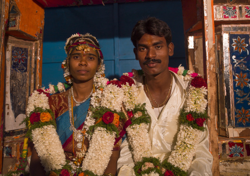 Newly Married Couple Dressed For The Ceremony With Flower Garland And Traditional Clothing Near The Mahamaham Tank, Kumbakonam, India