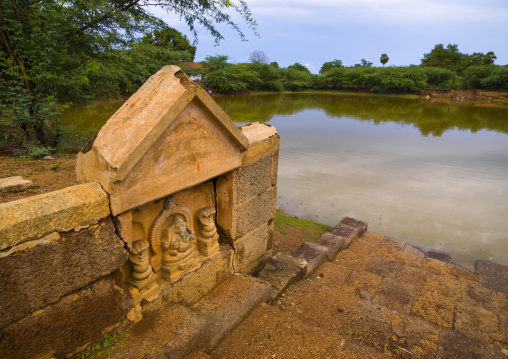 Carved Altar Dedicated To Lord Ganesh On The Banks Of A Tank Near Kanadukathan Chettinad, India