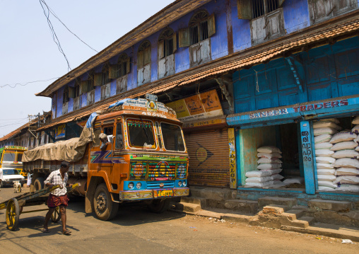 Painted Truck Parked In Front Of A Colorful House In Shopping Street Of Kochi, India