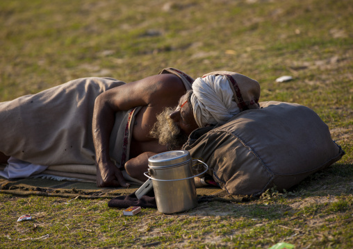 Sadhu Sleeping In A Field, Maha Kumbh Mela, Allahabad, India