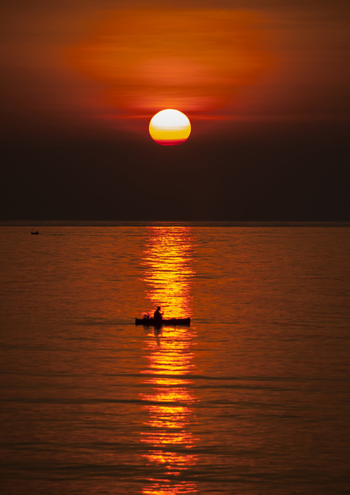 Boat Passing In The Sunset, Mataram, Lombok Island, Indonesia