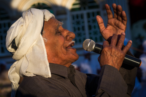old man singing during a wedding ceremony, Hormozgan, Bandar-e Kong, Iran