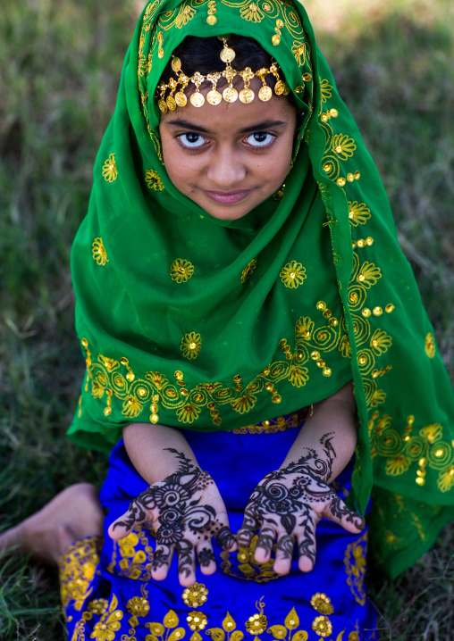 little girl with henna painted hands, Hormozgan, Bandar-e Kong, Iran