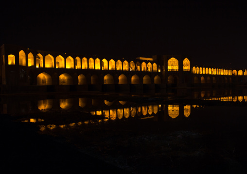 a view of the khaju bridge at night highlighting the arches, Isfahan Province, isfahan, Iran