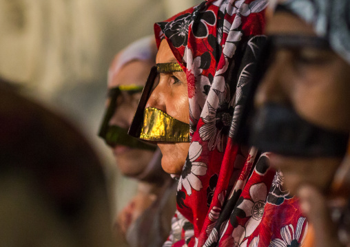 bandari women wearing the traditional masks called the burqas, Qeshm Island, Salakh, Iran