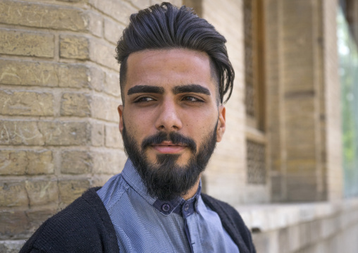 Young man with western haircut in the bazaar, Isfahan province, Isfahan, Iran