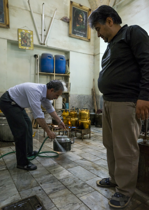Men preparing tea in a restaurant, Isfahan province, Isfahan, Iran