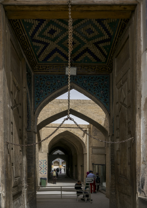 Friday mosque entrance with a chain to oblige the people to lower their head, Isfahan province, Isfahan, Iran