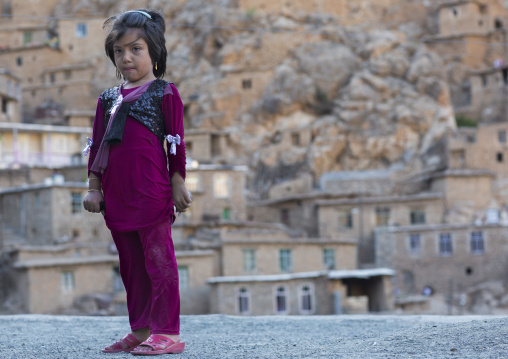 Little Girl Standing In Front Of Palangan Old Village, Iran