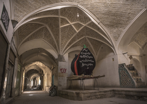 Giant coffin in the empty bazaar, Isfahan province, Kashan, Iran
