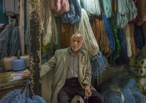 Man selling wool in the bazaar, Isfahan province, Kashan, Iran