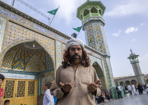 Pakistani pilgrim in front of the shrine of fatima al-masumeh, Qom province, Qom, Iran