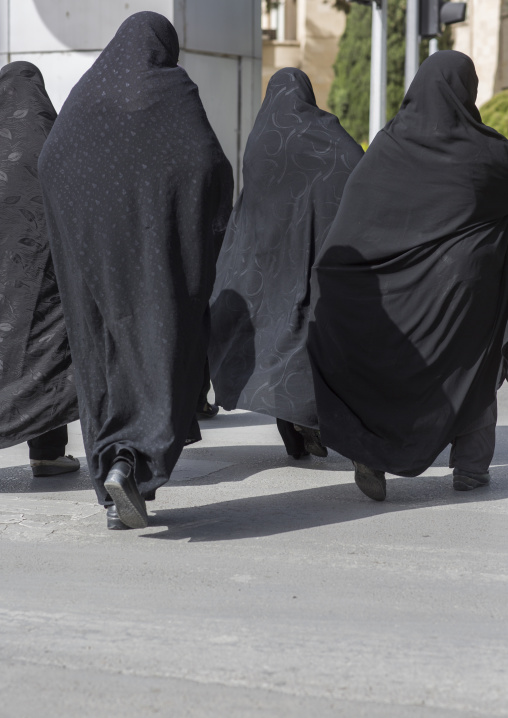 Women walking in tchador in the street, Isfahan province, Isfahan, Iran