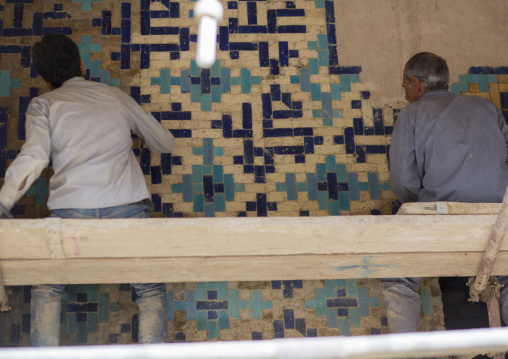 Renovation of mosaic pattern with ceramic tiles in an old building, Isfahan province, Isfahan, Iran