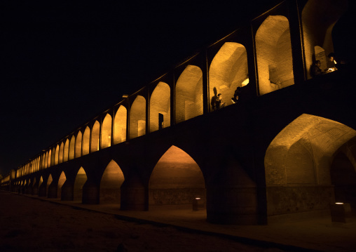 A view of the Khaju bridge at night highlighting the arches, Isfahan Province, Isfahan, Iran